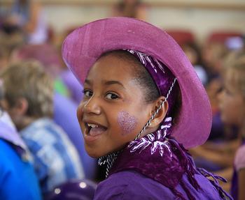 Kids Reach New Summits in Planning Purple Cake Day Events